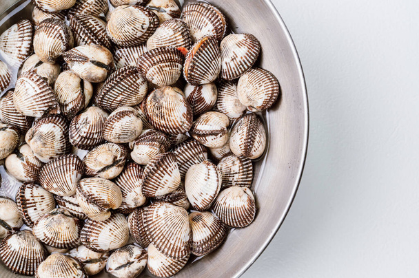       Fresh seafood cockles in a bowl - Photo, Image
