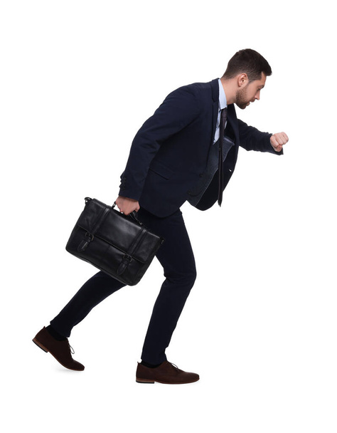 Handsome bearded businessman in suit with briefcase on white background - Zdjęcie, obraz