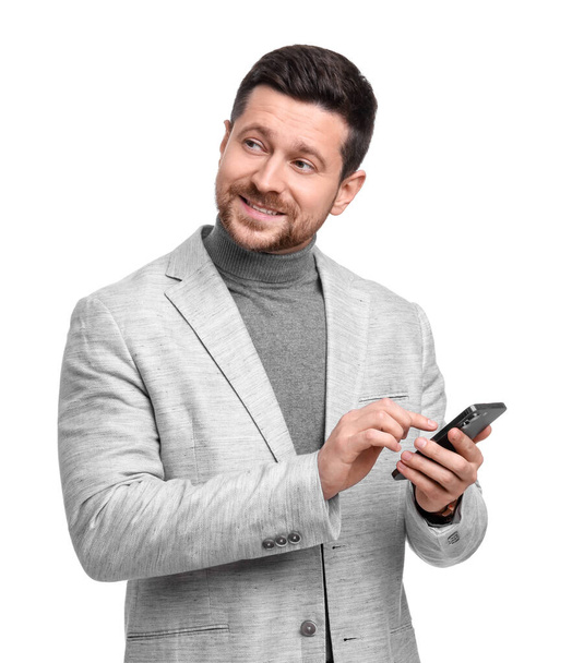 Handsome bearded businessman with smartphone on white background - Фото, зображення