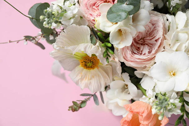 Bouquet of beautiful flowers on pink background, closeup - Zdjęcie, obraz