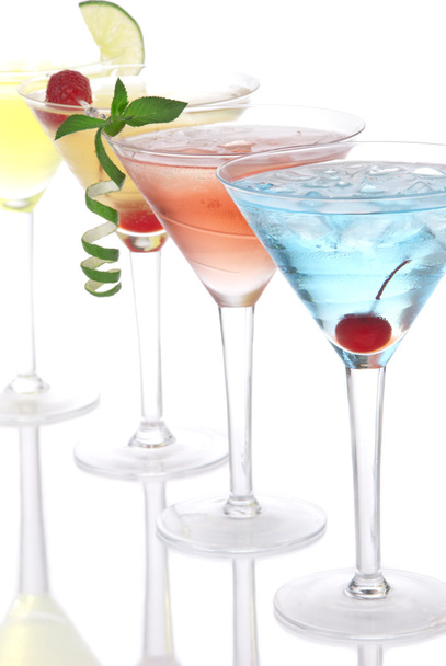 Martini alcohol cocktails in row blue hawaiia - Photo, Image