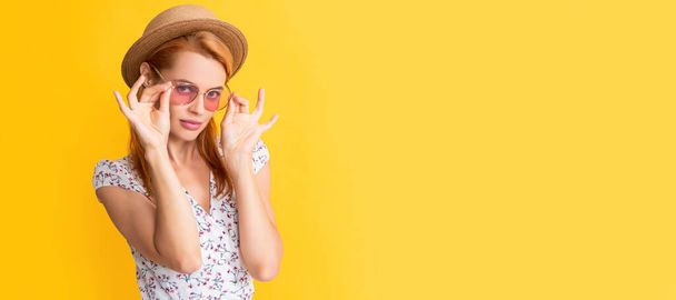 young woman smile in straw hat and sunglasses on yellow. Woman isolated face portrait, banner with copy space background - Foto, Imagem