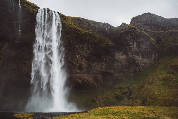 South Region, Iceland - July 29, 2019 - beautiful waterfall of Seljalandsfoss. High quality photo - Фото, изображение