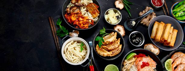 Various  asian meals dishes on black background , top view. Asian food concept. Copy space. Banner, panorama - Fotoğraf, Görsel