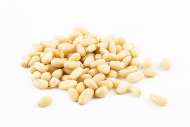 pine nuts isolated on a white background, cedar pine nut - Photo, Image