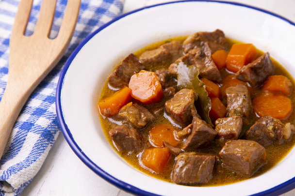 Beef stew with carrot, onion, potato and other vegetables. - Photo, Image