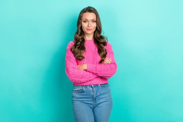 Portrait of optimistic adorable nice girl curly hairstyle wear purple pullover standing arms crossed isolated on teal color background. - Фото, зображення