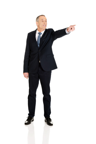 Businessman pointing on someone - Foto, afbeelding