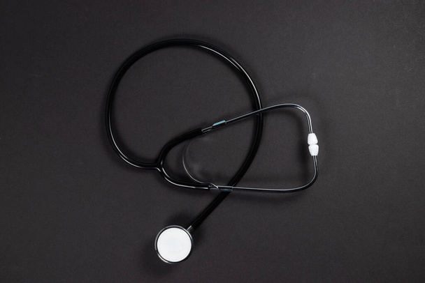 top view of stethoscope on gray surface. - Photo, Image