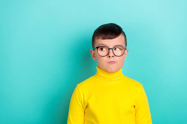 Photo of puzzled boy look empty space wonder incredible toy store shop sale discounts isolated cyan color background. - Фото, зображення