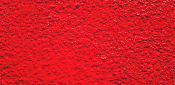 Rough or grunge red painted concrete or cement wall for background. Retro wallpaper, Colorful, Painting and Texture of surface concept.  - Foto, Bild