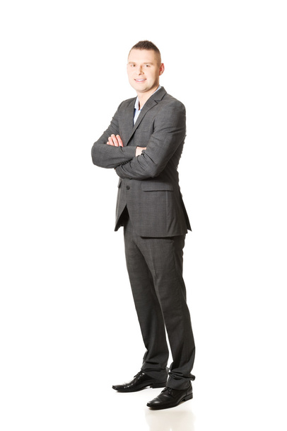 Businessman with folded hands - Fotó, kép