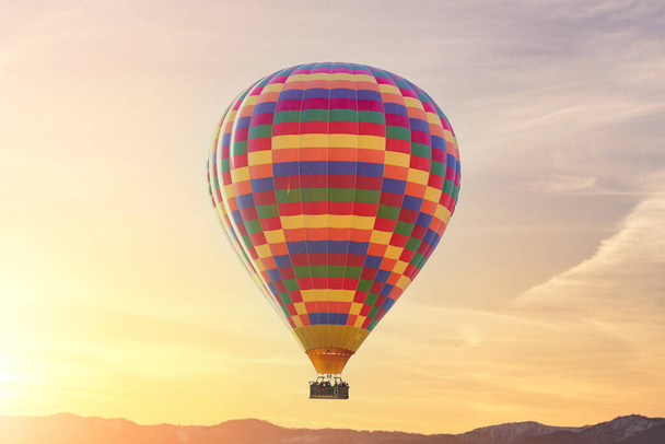 Landscape of fabulous Kapadokya. Colorful flying air balloon in sky at sunrise in Anatolia. Vacations in beautiful destination in Goreme, Turkey  - Φωτογραφία, εικόνα