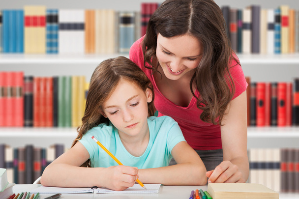Mother And Daughter Studying - Foto, Imagen