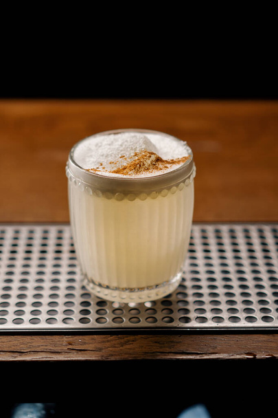 delicious alcoholic coconut paradise cocktail standing on bar bar party club alcohol concept - Photo, Image