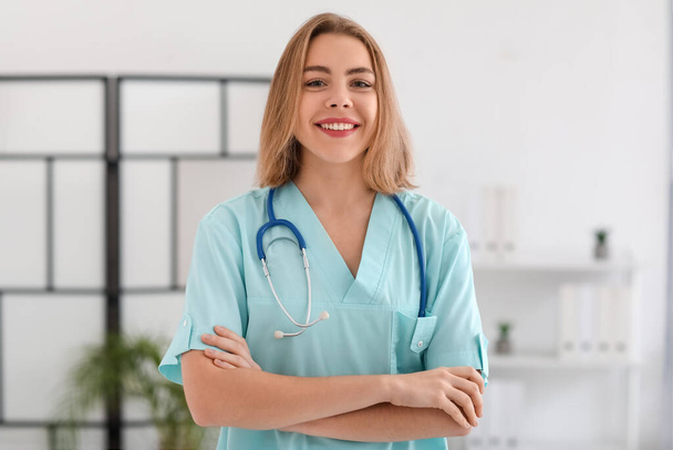 Female medical assistant in modern clinic - Фото, зображення