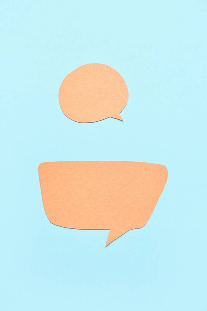 Blank paper speech bubbles on blue background - Photo, image