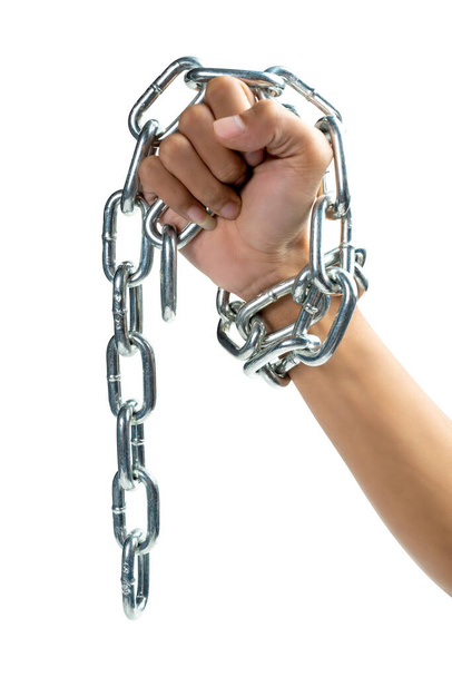 Humans hand-tied with a chain of metal steel isolated over white background - Foto, Imagen