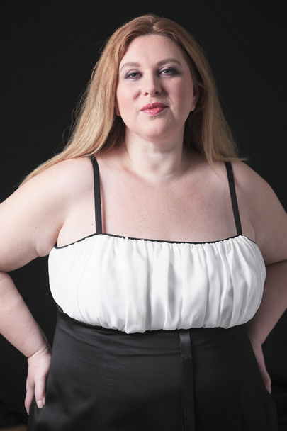 A fashion woman in studio black background - Foto, imagen