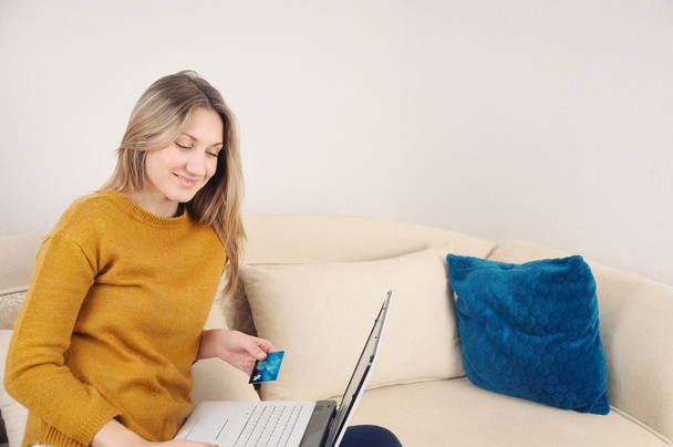 happy woman doing online shopping at home - Photo, Image
