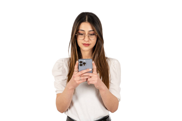 Woman using smartphone, portrait of confident young woman using smartphone. People emotions, lifestyle and beauty concept. Messaging, texting, online mobile application, modern phone.  - Φωτογραφία, εικόνα