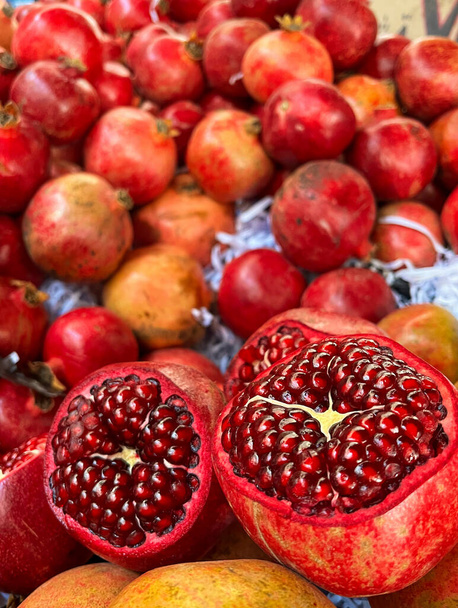 Pomegranate fruits. Fruit trade in the market. - Photo, Image