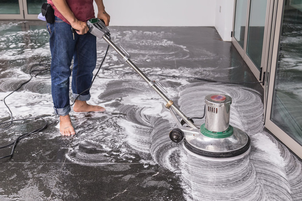 Man cleaning floor - Photo, Image