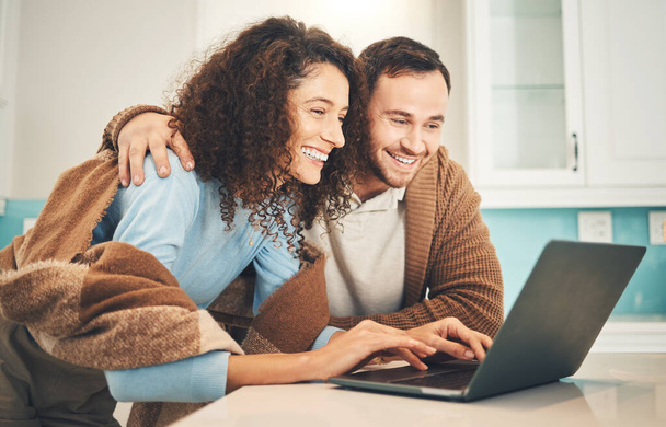 Happy couple, laptop and typing for search, internet or social network for meme in home together. Young man, woman and computer with laughing, happiness and excited face for results of web research. - Photo, Image