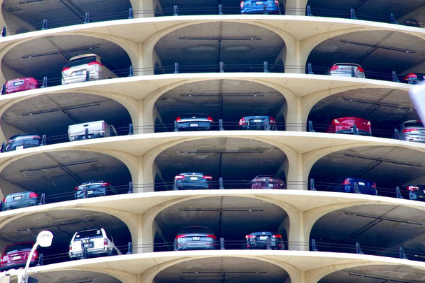Cars parked in Marina City Car Park. Designed by Bertrand Goldberg, 1968. Chicago, Illinois, USA. Sptember 16, 2016.  - Фото, изображение