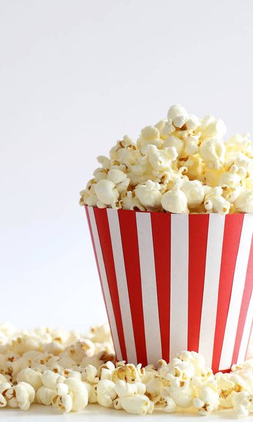 Tasty salted popcorn background. Cinema, movies and entertainment concept. Copy space. - Fotoğraf, Görsel