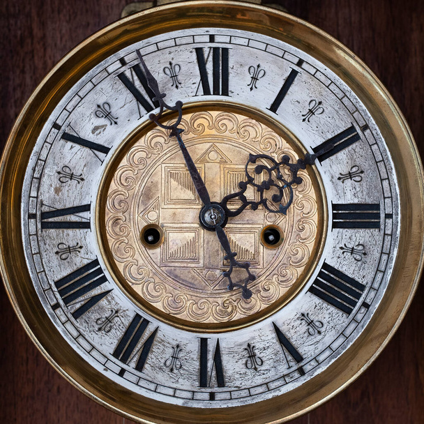 Vintage Clock with Hands.Close up view on clock face of the historical watches with golden frame - Fotografie, Obrázek