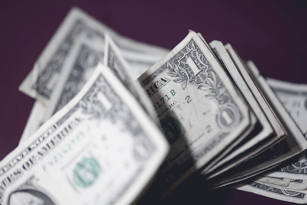 Close-up de fundo monetário com notas de dólar. Conceito de economia e finanças. - Foto, Imagem