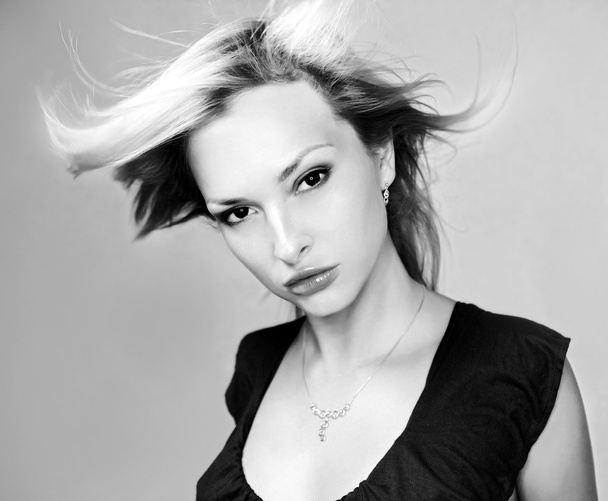 Young blond woman portrait.Black-white photo. - Foto, Imagen