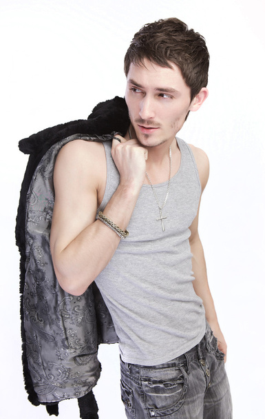 Man in a fur coat. Fashion photo. - Фото, изображение