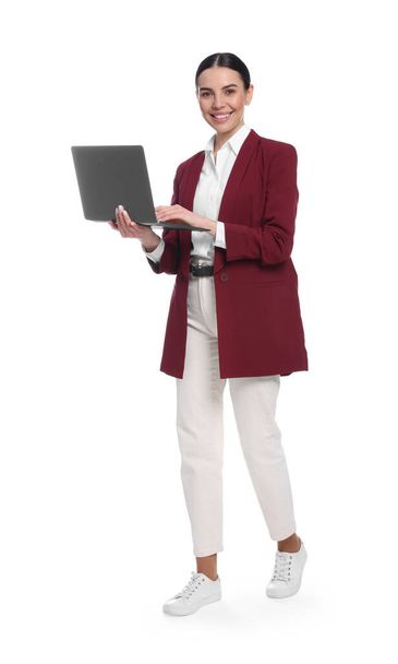 Happy woman with laptop on white background - Foto, afbeelding