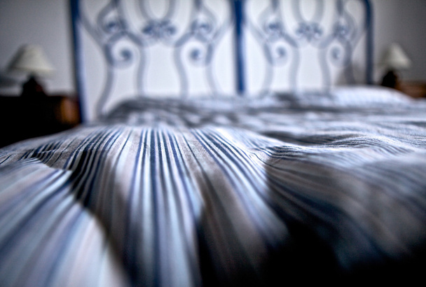 Bed in a luxury hotel room. Italy. - Фото, зображення