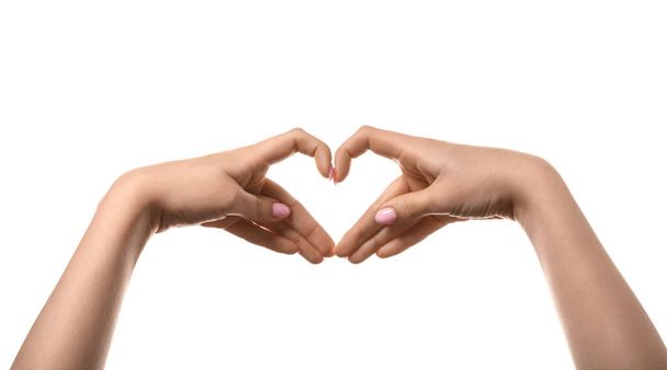 Woman making heart with her hands on white background - Photo, image