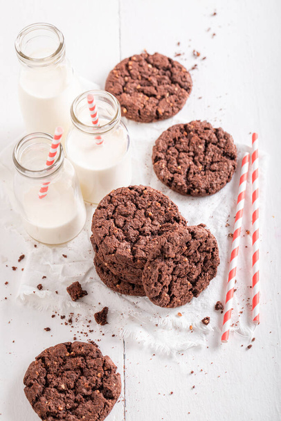 Sweet brown cookies as a lunch snack. Brown cookies best taste with milk. - Photo, Image