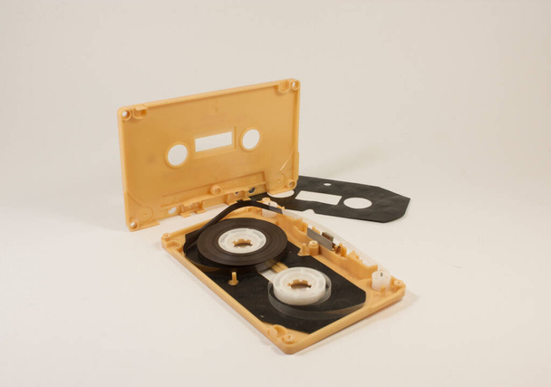 parts of cassette tape on white background - Valokuva, kuva
