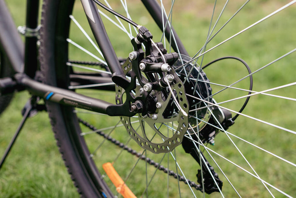 Bicycle gears, disc brake and rear derailleur. The switches are on the steering wheel - Photo, Image
