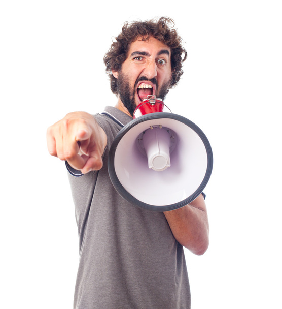 young crazy man angry with a megaphone - Zdjęcie, obraz