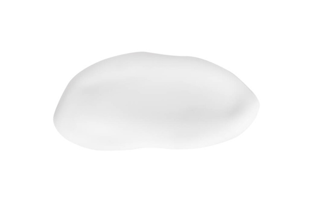 Uma mancha de nata cosmética branca sem sombras em um contexto branco. Isolados. - Foto, Imagem