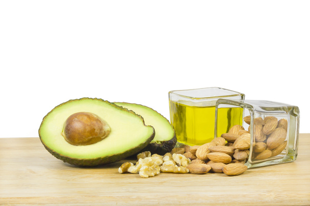 Good fats diet (avocado, dry fruits and oil) - Photo, Image