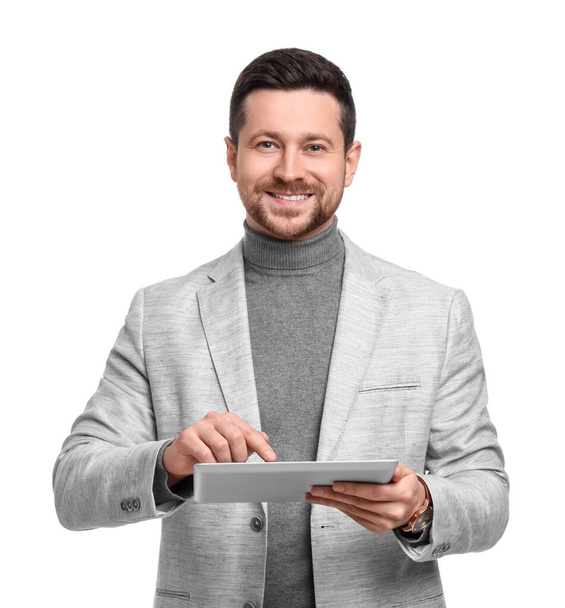 Handsome bearded businessman using tablet on white background - Фото, изображение