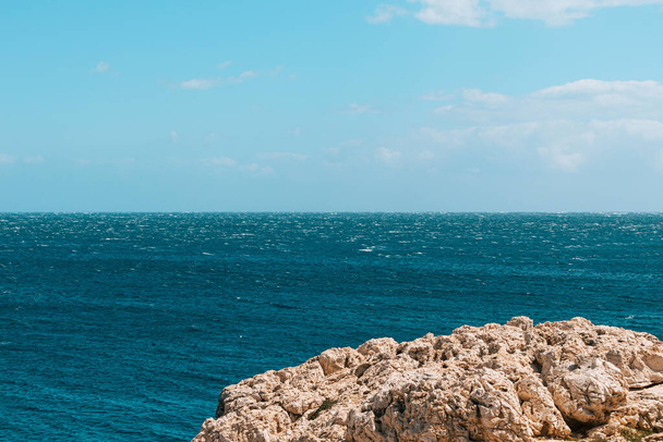 Sea View. View of the sea on a sunny day from the mountain, blue water and blue sky in the background. - Photo, Image