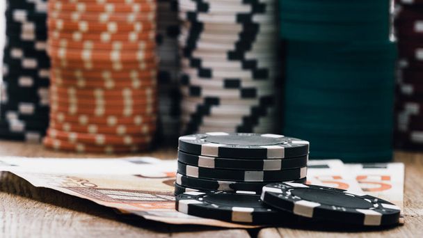 Stack of poker chips for high-stakes casino games - Fotó, kép