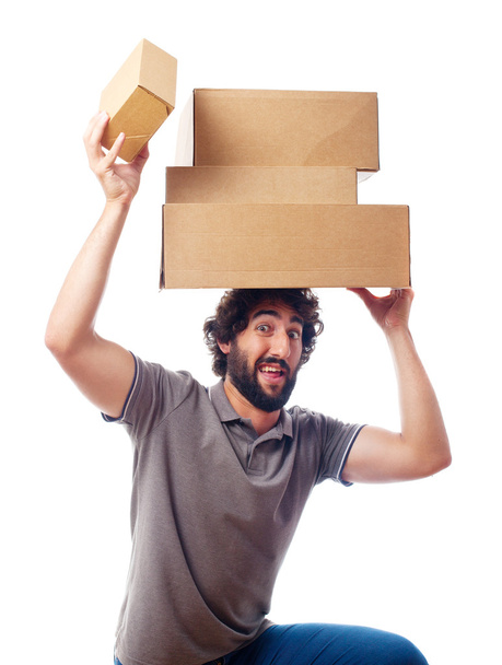 young crazy man with boxes - 写真・画像