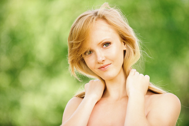 Portrait of young beautiful fair-haired woman - Photo, Image