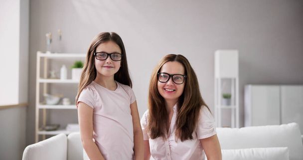 Family Eyeglasses. Happy Mother And Child Wearing Glasses - Zdjęcie, obraz