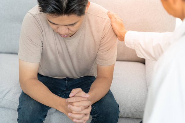 man with mental health problems is consulting. psychiatrist is recording the patient's condition for treatment. encouragement, love and family problem, bipolar , depression patient, protect suicide - Photo, Image